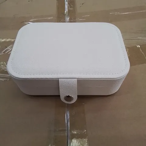 A BOX OF APPROXIMATELY 50 VANITY CASES IN WHITE WITH GLITTER EFFECT