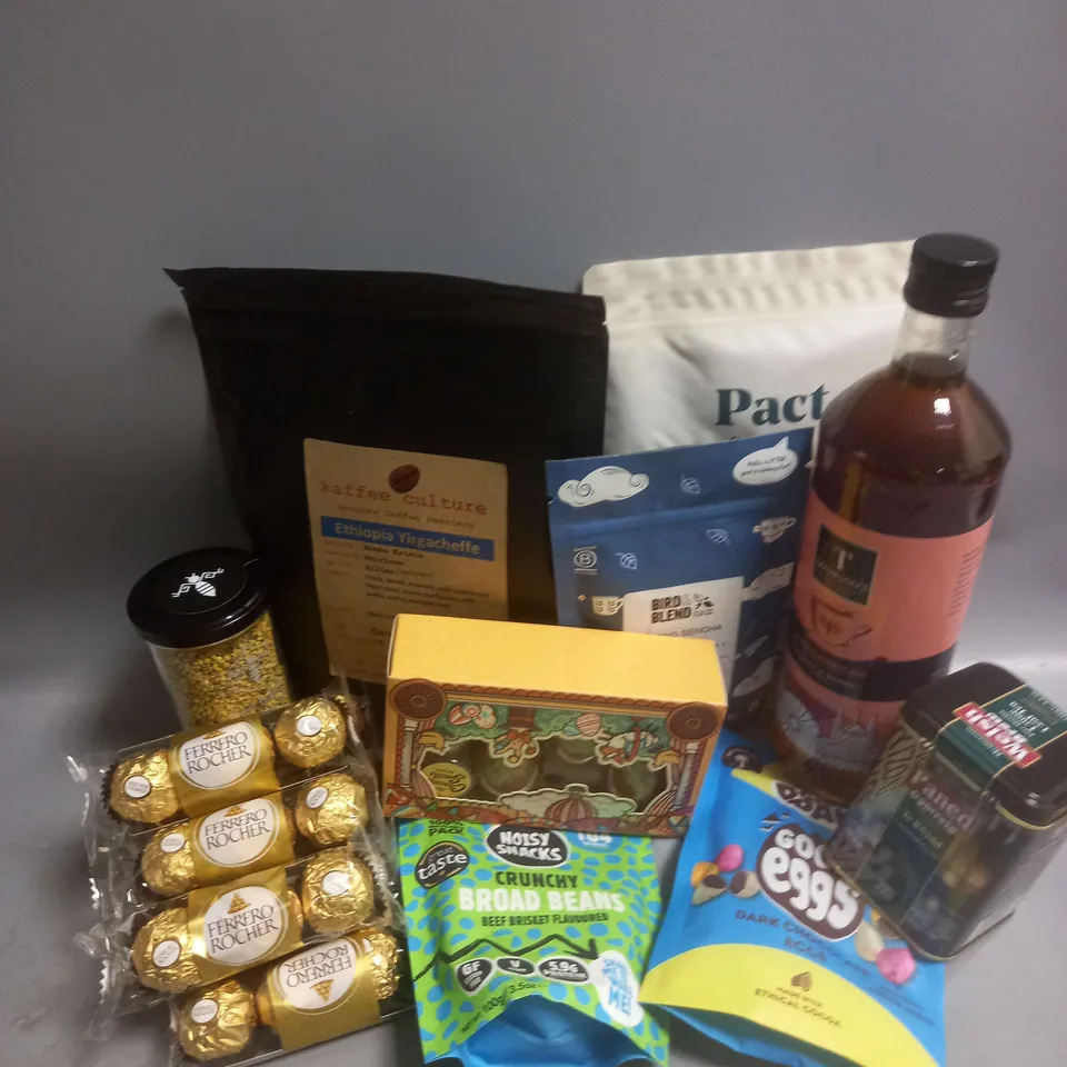 TOTE OF APPROX 12 ASSORTED FOOD ITEMS TO INCLUDE - FERERRO ROCHER 3PACK - DOISY & DAM DARK CHOCOLATE EGGS - BIRD & BLEND SPRING SENCHA TEA ETC