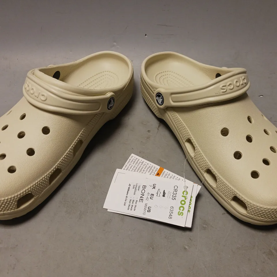 PAIR OF CROCS CLOGS IN BONE UK SIZE 7