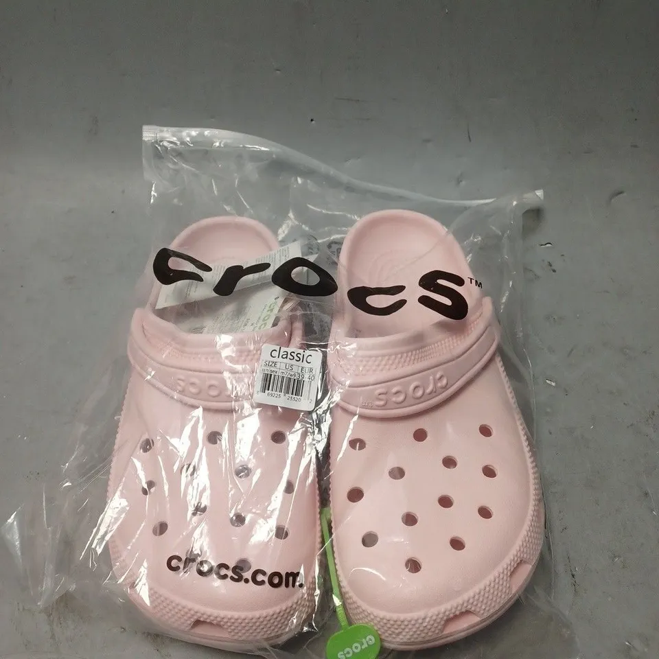 BAGGED AND SEALED CLASSIC CROCS IN LIGHT PINK - UK SIZE M7/W9