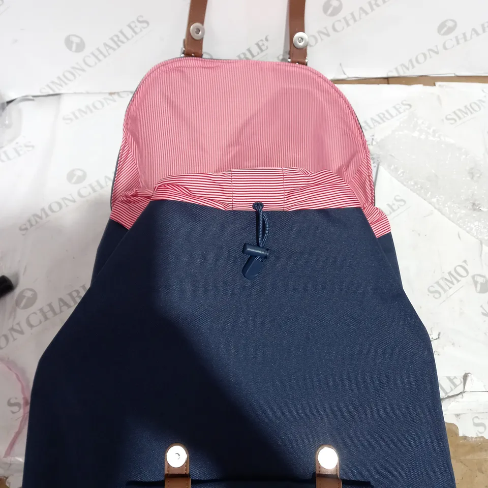 NAVY HERSCHEL RETREAT BACKPACK WITH BROWN STRAPS AND FOLD OVER TOP