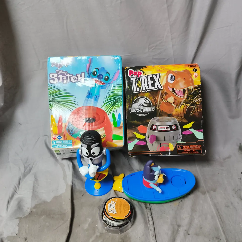 box of approximately 12 assorted items to include pop up trex game, pop up stitch game, bluey toy etc
