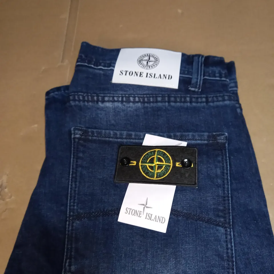 PAIR OF STONE ISLAND DENIM JEANS SIZE W 32