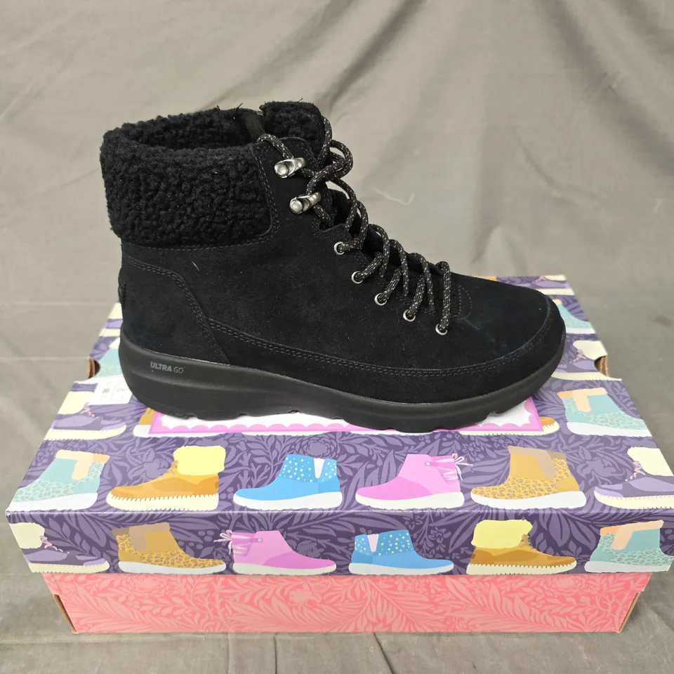 BOXED PAIR OF SKECHERS GO WALK BOOTS IN BLACK - 7