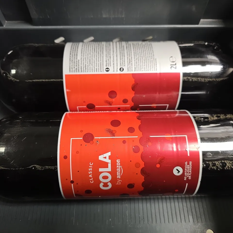 APPROXIMATELY 4 ASSORTED DRINKS ITEMS TO INCLUDE - PEPSI MAX CHERRY , COLA AMAZON