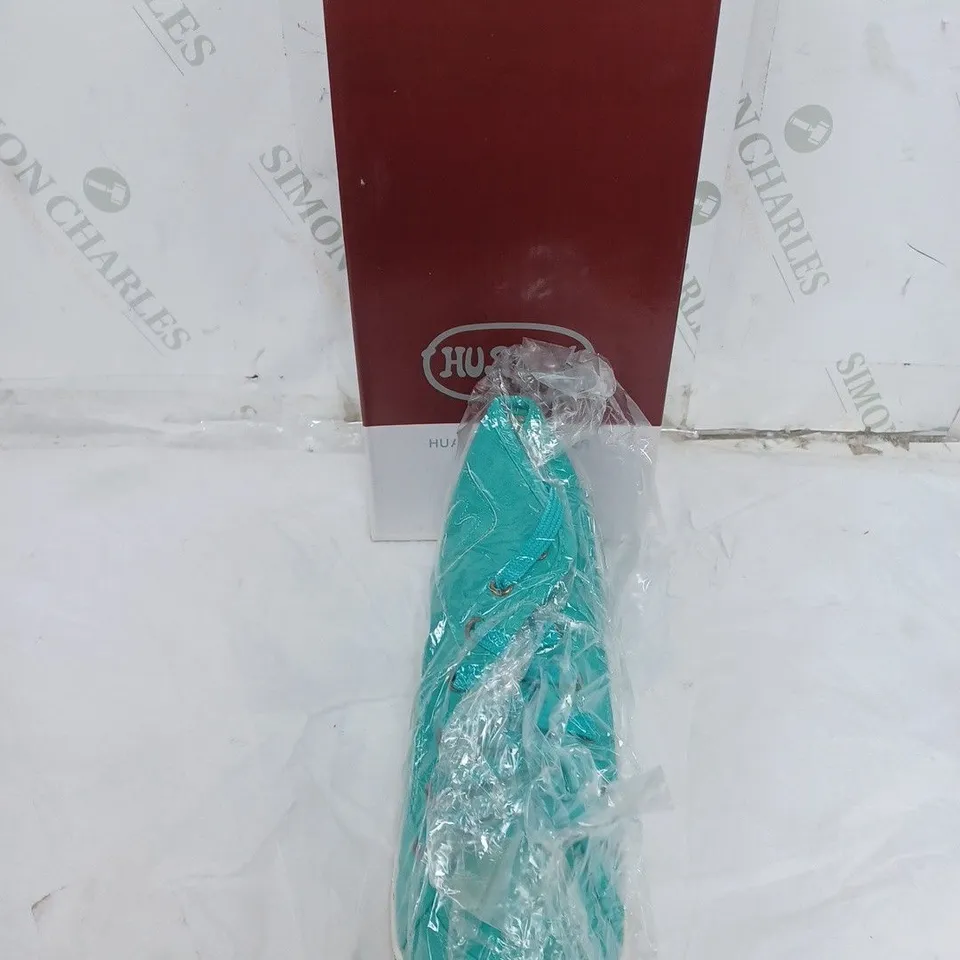 LARGE BOX OF APPROXIMATELY 10 BOXED HURLON GREEN HIGH TRAINERS IN VARIOUS SIZES 