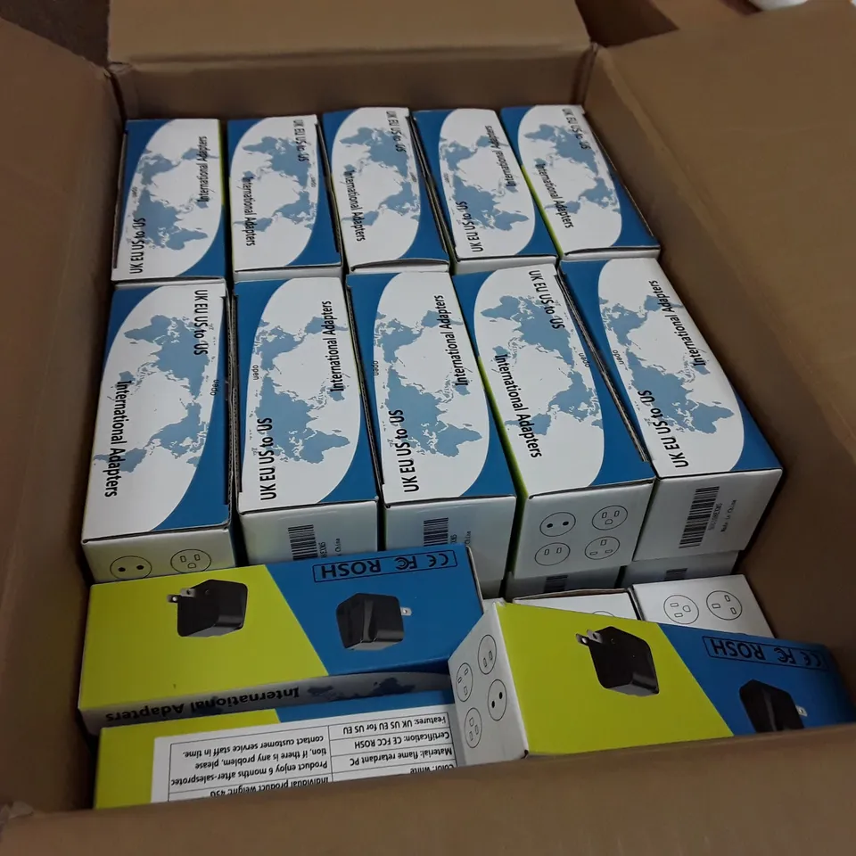 BOX CONTAINING APPROXIMATELY 55 BOXES EACH CONTAINING 4 UK,EU,US TO EU INTERNATIONAL ADAPTERS