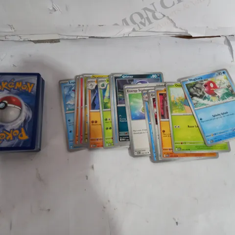 BOX OF APPROX 30 COLLECTABLE POKEMON TRADING CARDS