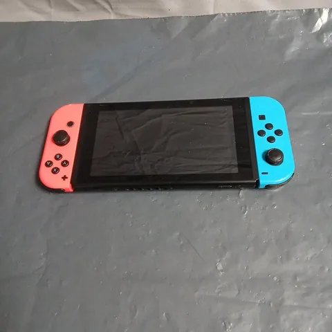 NINTENDO SWITCH CONSOLE – NEON RED/BLUE JOY-CONS