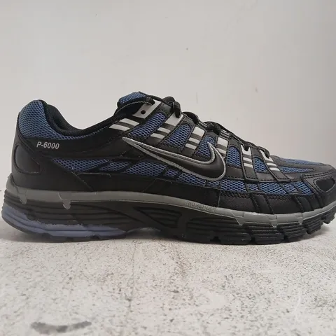 PAIR OF NIKE P-6000 TRAINERS IN BLUE/BLACK SIZE UK 9.5