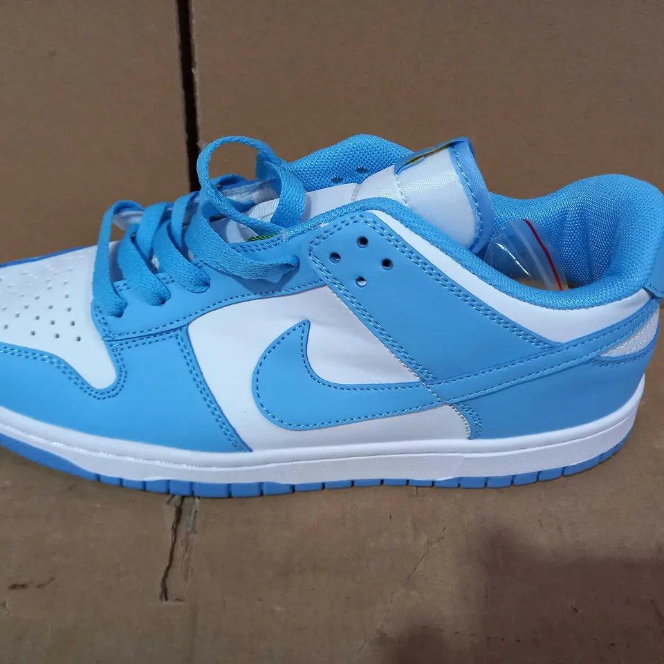 PAIR OF  DESIGNER SHOES IN THE STYLE OF NIKE IN BLUE/WHITE UK SIZE 7
