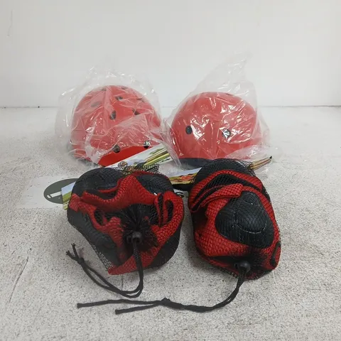 SET OF 2 SMALL RED BICYCLE HELMETS WITH PROTECTIVE PADS BOXED