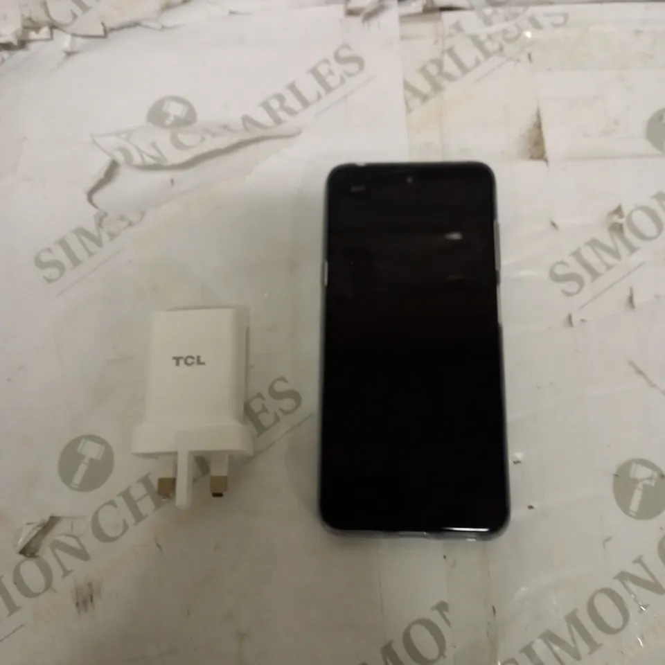 TLC 20L MOBILE PHONE + CHARGER PLUG