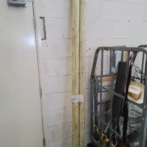 TWO WOODEN POLES