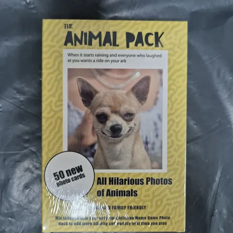 BOX OF APPROXIMATELY 40 SEALED ANIMAL PHOTO PACKS FOR THE CHRISTIAN MEME GAME