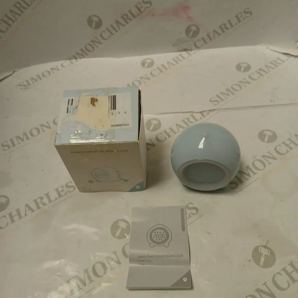 BOXED PEACH SMART ALARM CLOCK WITH USB CABLE AND MANUAL
