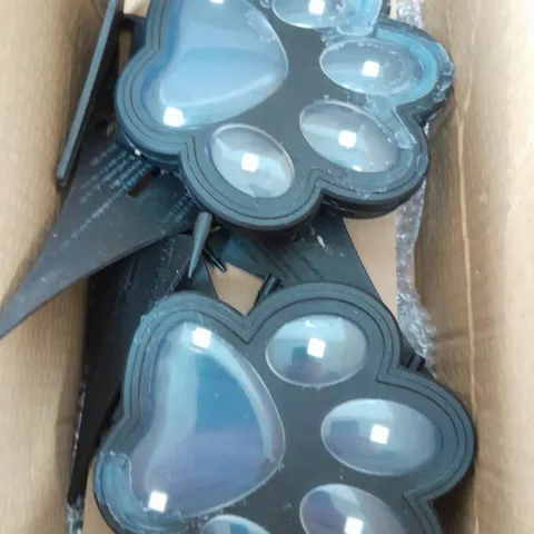 BOXED BELL AND HOWELL SET OF 4 SOLAR PAW LIGHTS