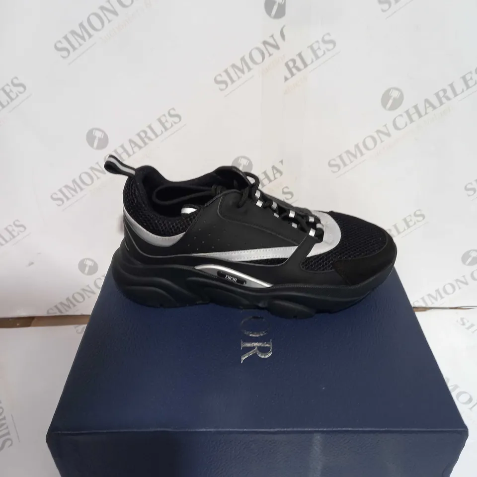 BOXED PAIR OF NAVY/SILVER TRAINERS SIZE 42