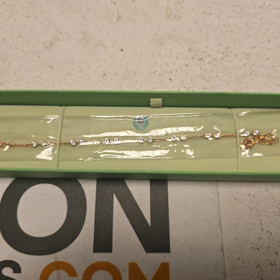 SWARVOSKI ROSE GOLD TONE CRYSTAL BRACELET – GREEN PRESENTATION BOX