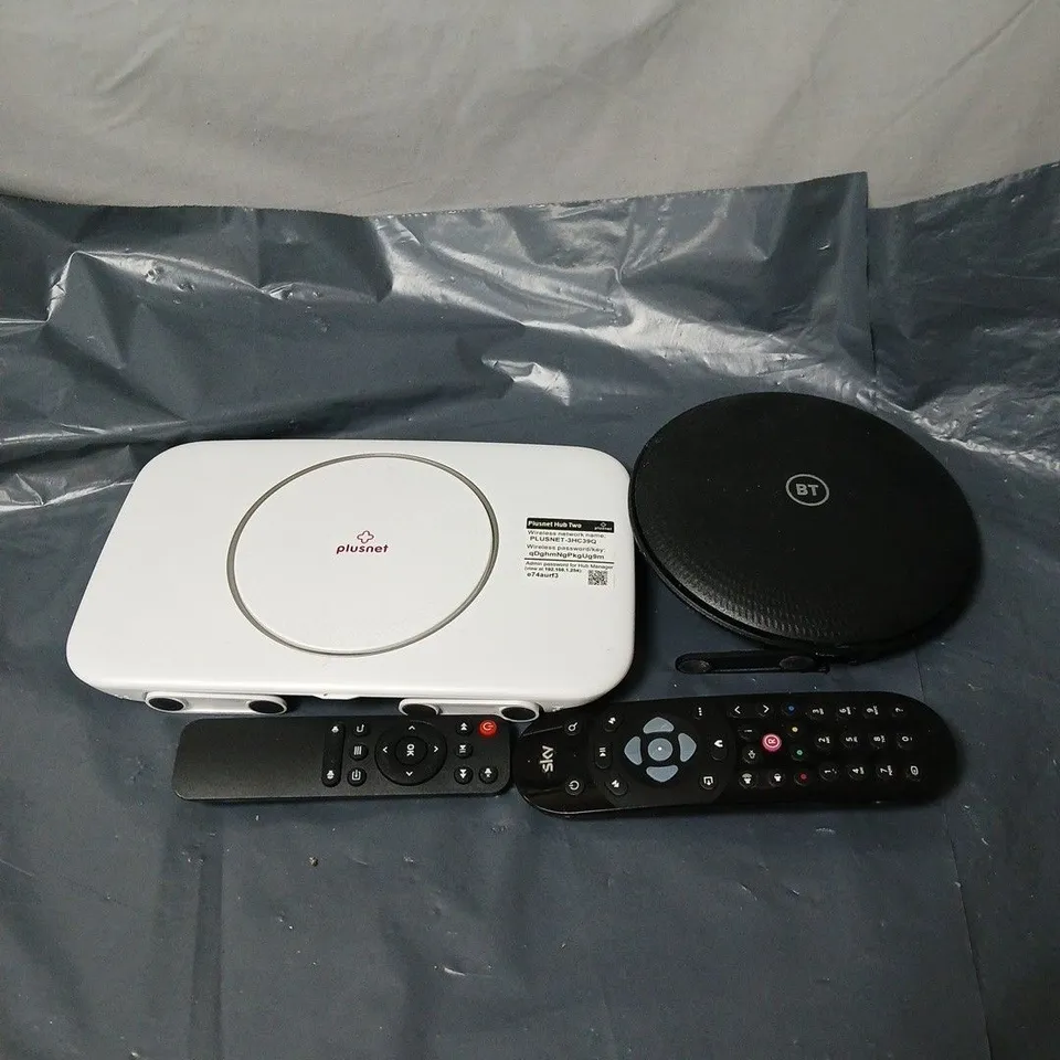 APPROXIMATELY 12 ASSORTED HOUSEHOLD ITEMS TO INCLUDE ROUTERS, REMOTE CONTROLS ETC
