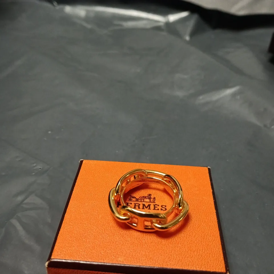 HERMÈS PARIS GOLD-TONE RING WITH INTERLOCKING HOOP DESIGN