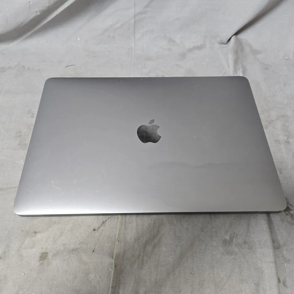 APPLE MACBOOK PRO LAPTOP – SILVER. NO ACCESSORIES