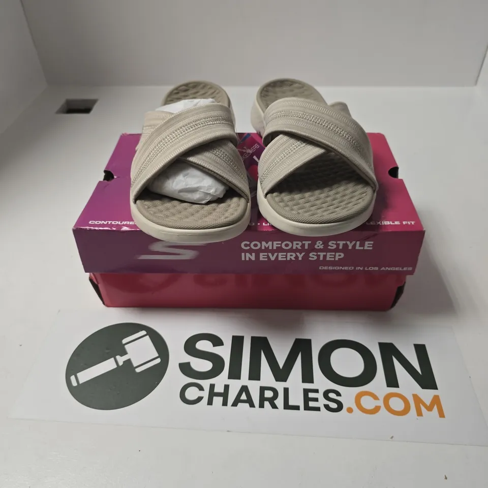 BOXED PAIR OF SKECHERS GO WALK FLEX SANDALS IN TAUPE - UK 5