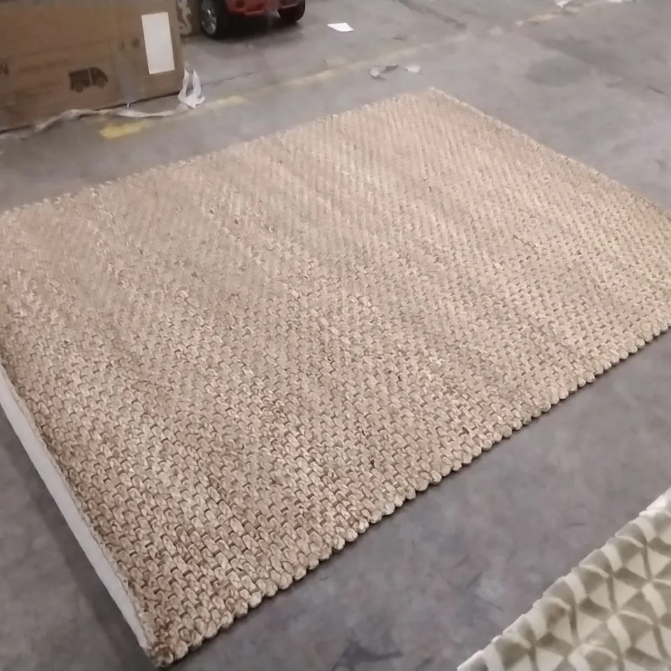 STILLAGE OF APPROXIMATELY 24 DESIGNER RUGS
