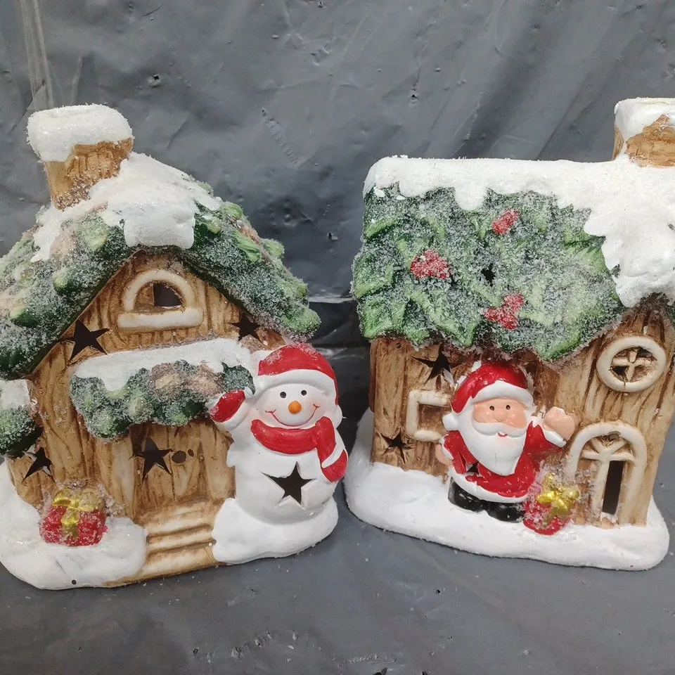 FESTIVE SET OF 2 LIT CERAMIC SANTA/SNOWMAN HOUSE CHRISTMAS DECORATIONS 