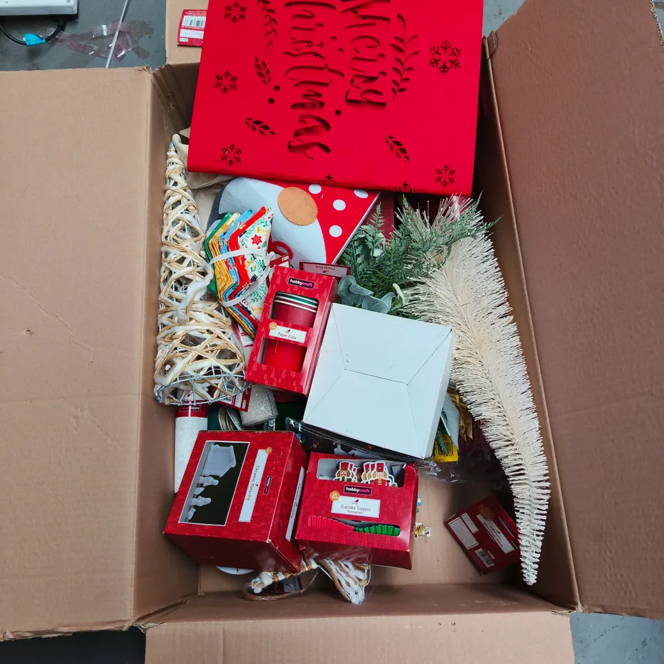 BOX OF APPROXIMATELY 20 ASSORTED HOBBY CRAFT CHRISTMAS ITEMS TO INCLUDE NUTCRACKER CUPCAKE TOPPERS, PAPERS CUPS, CERAMIC NATIVITY ETC