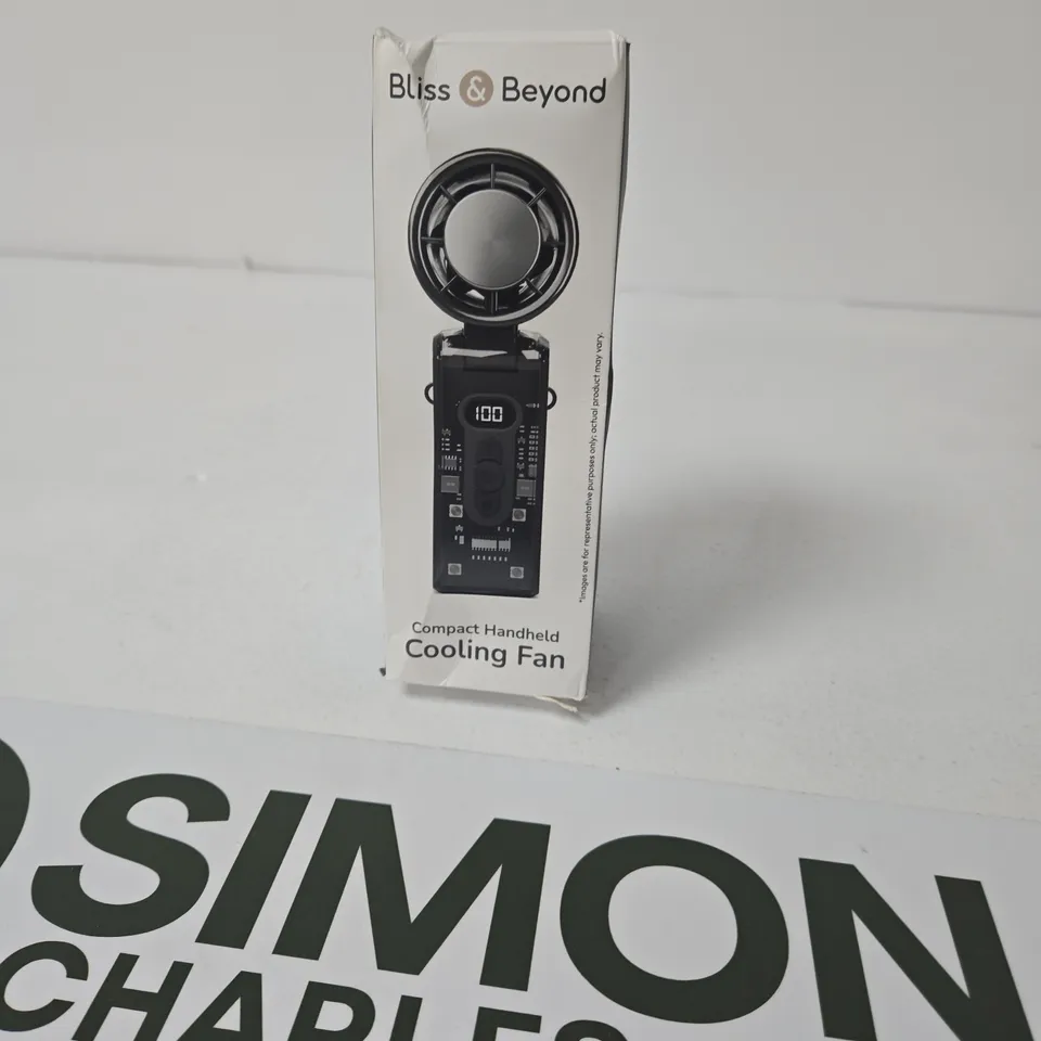 BLISS & BEYOND COMPACT HANDHELD COOLING FAN – BOXED