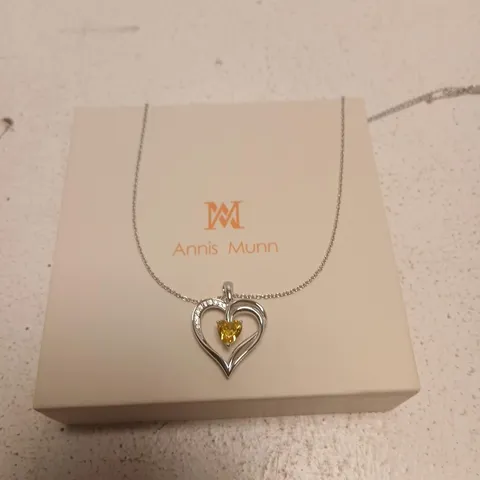 ANNIS MUNN SILVER HEART PENDANT NECKLACE WITH YELLOW GEM