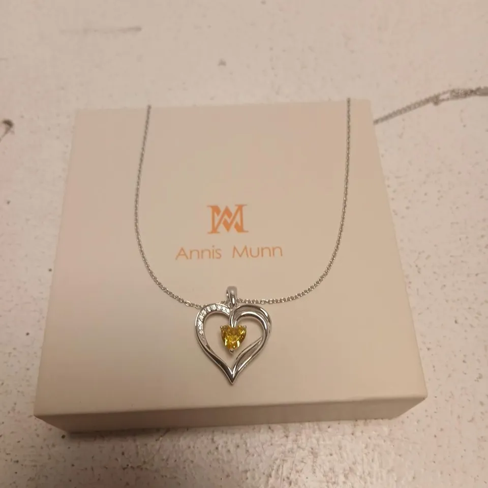 ANNIS MUNN SILVER HEART PENDANT NECKLACE WITH YELLOW GEM
