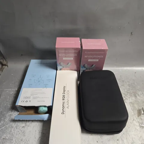 TOTE OF ASSORTED ITEMS TO INCLUDE ALARM CLOCK, MANSCAPED AND ROUTER