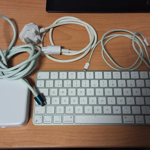 LOT OF APPLE IMAC PERIPHERALS INCLUDES 143W IMAC POWERS ADAPTER, KEYBOARD AND LIGHTENING CABLE