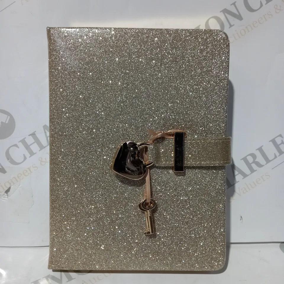 CAGIE CODE BOOK SERIES JORNAL IN METALLIC GOLD COLOUR W. GLITTER EFFECT