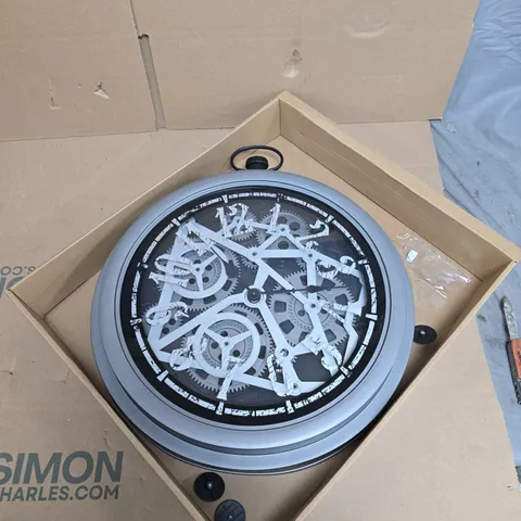 ROUND SKELETON GEAR WALL CLOCK – SILVER FRAME - BOXED 