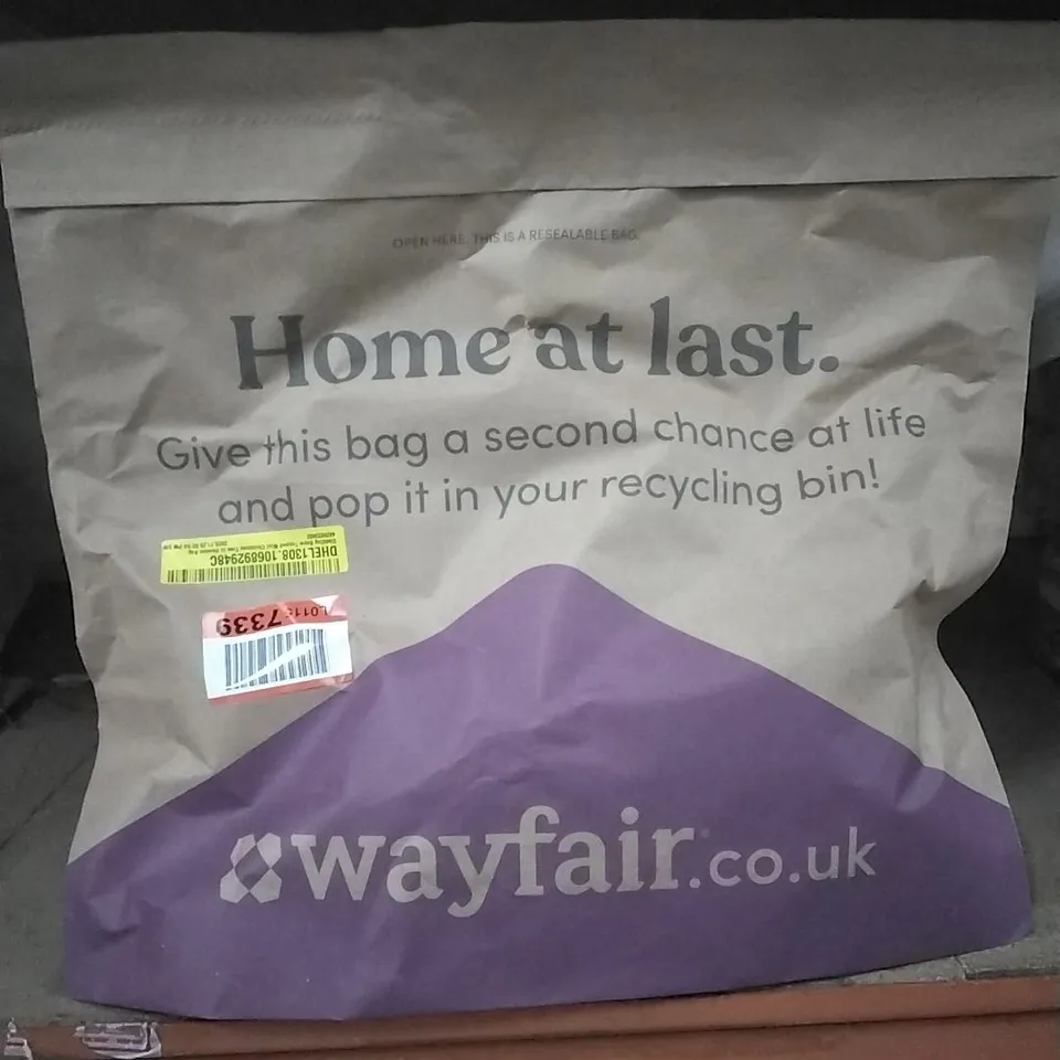 BAGGED GLADDING SNOW TOPPED MINI CHRISTMAS TREE IN HESSIAN BAG