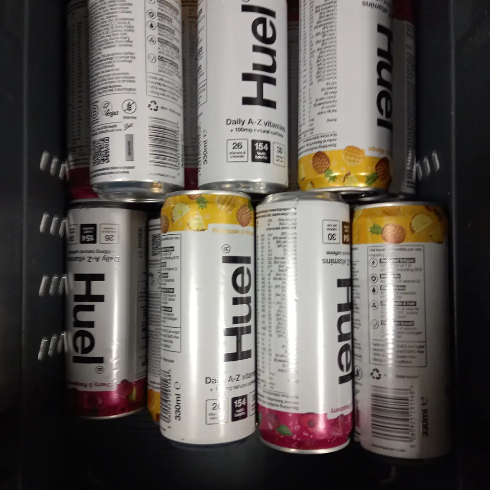 APPROXIMATELY 10 HUEL MULTI VITAMIN DRINKS IN CHERRY RASPBERRY & PINEAPPLE MANGO - COLLECTION ONLY 