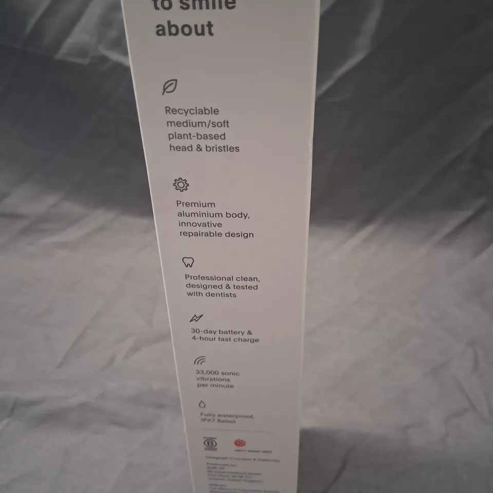 BOXED SURI SUSTAINABLE SONIC TOOTHBRUSH SUNSET BLOOM 