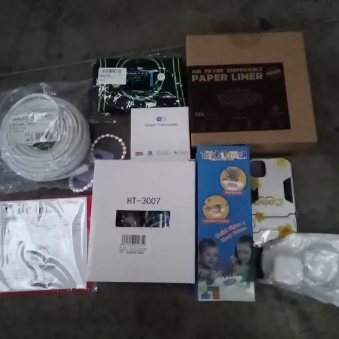 PALLET OF 6 BOXES CONTAINING ASSORTED ITEMS INCLUDING AIR FRYER LINERS, TETRIS TOWER, SAT CABLE, KNEE SLEEVES, ANNIVERSARY CARD, IPHONE CHARGER