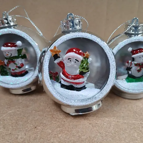 APPROXIMATELY TWELVE SETS OF THREE HANGING BAUBLES SILVER