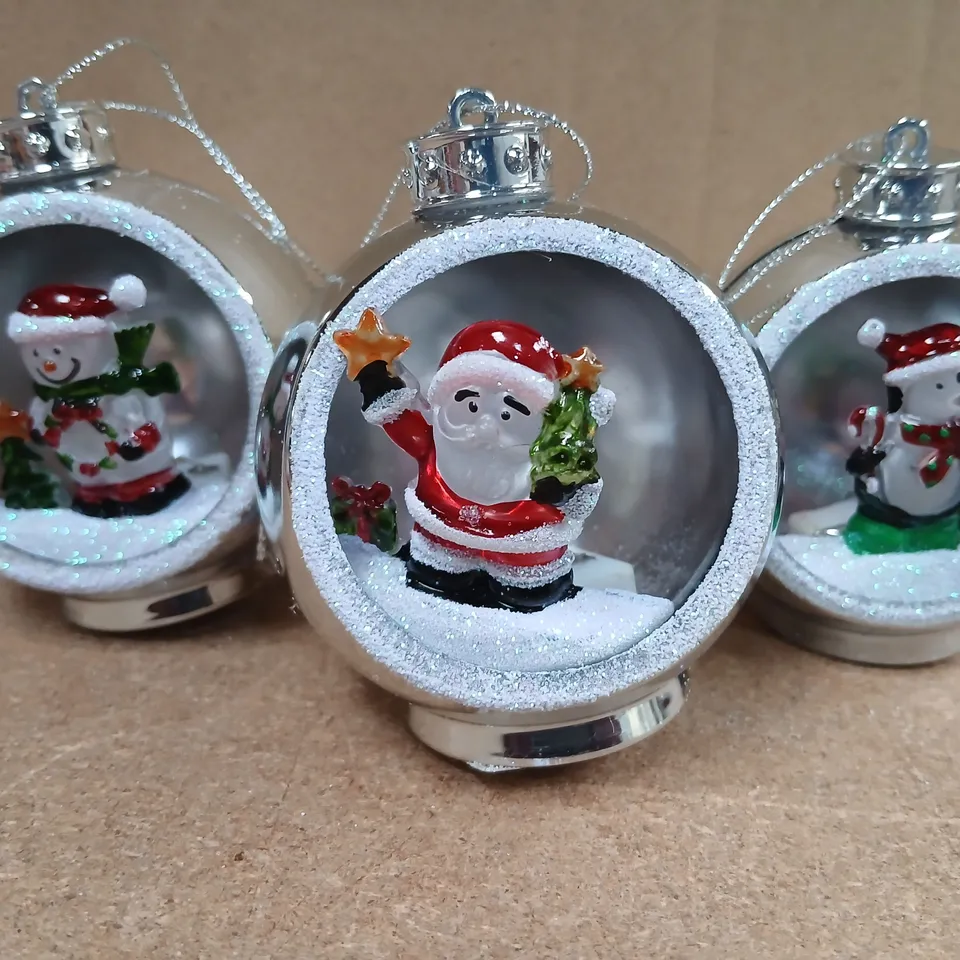 APPROXIMATELY TWELVE SETS OF THREE HANGING BAUBLES SILVER