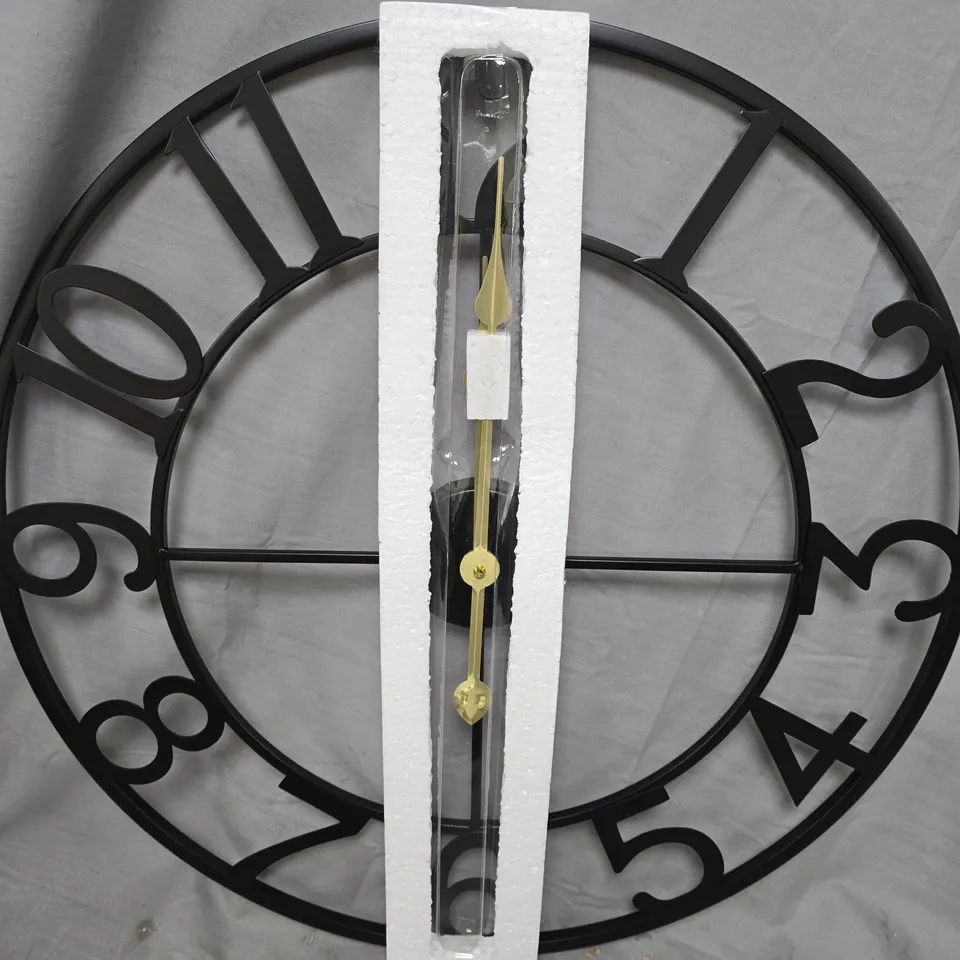 LARGE ROUND BLACK METAL WALL CLOCK WITH OPEN NUMERALS
