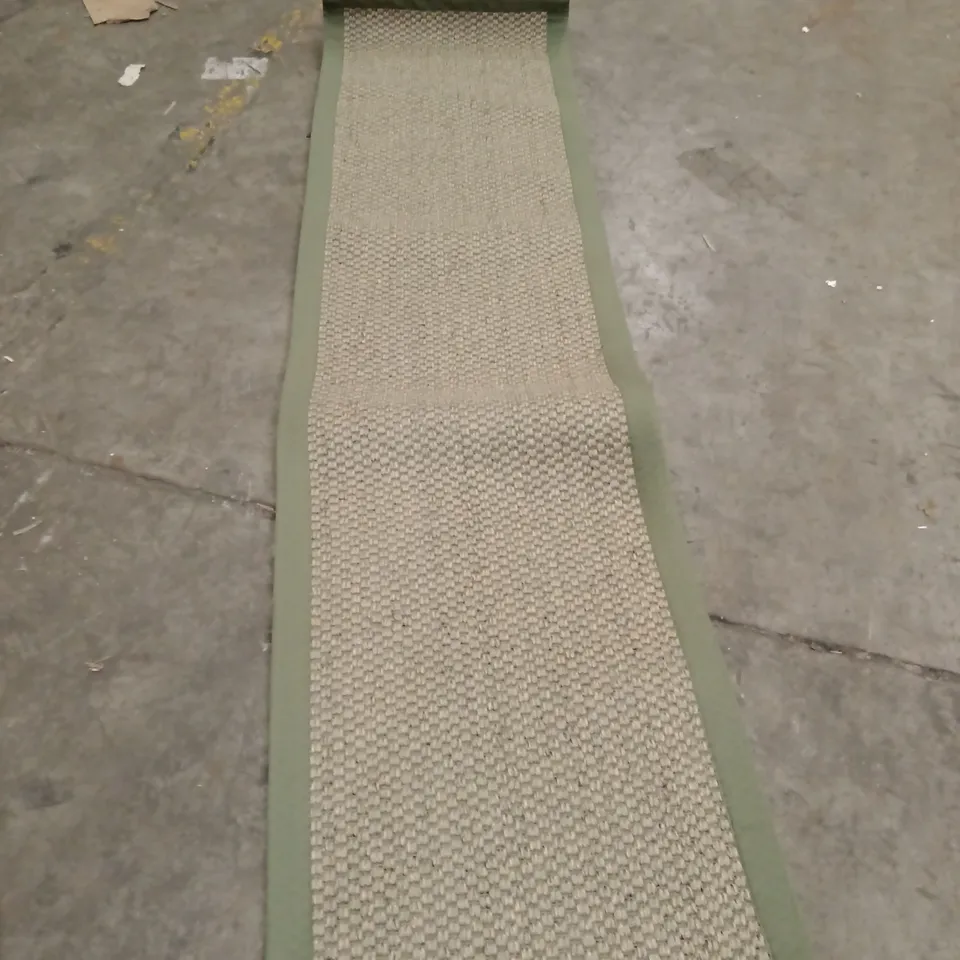 STILLAGE OF APPROXIMATELY 25 DESIGNER RUGS