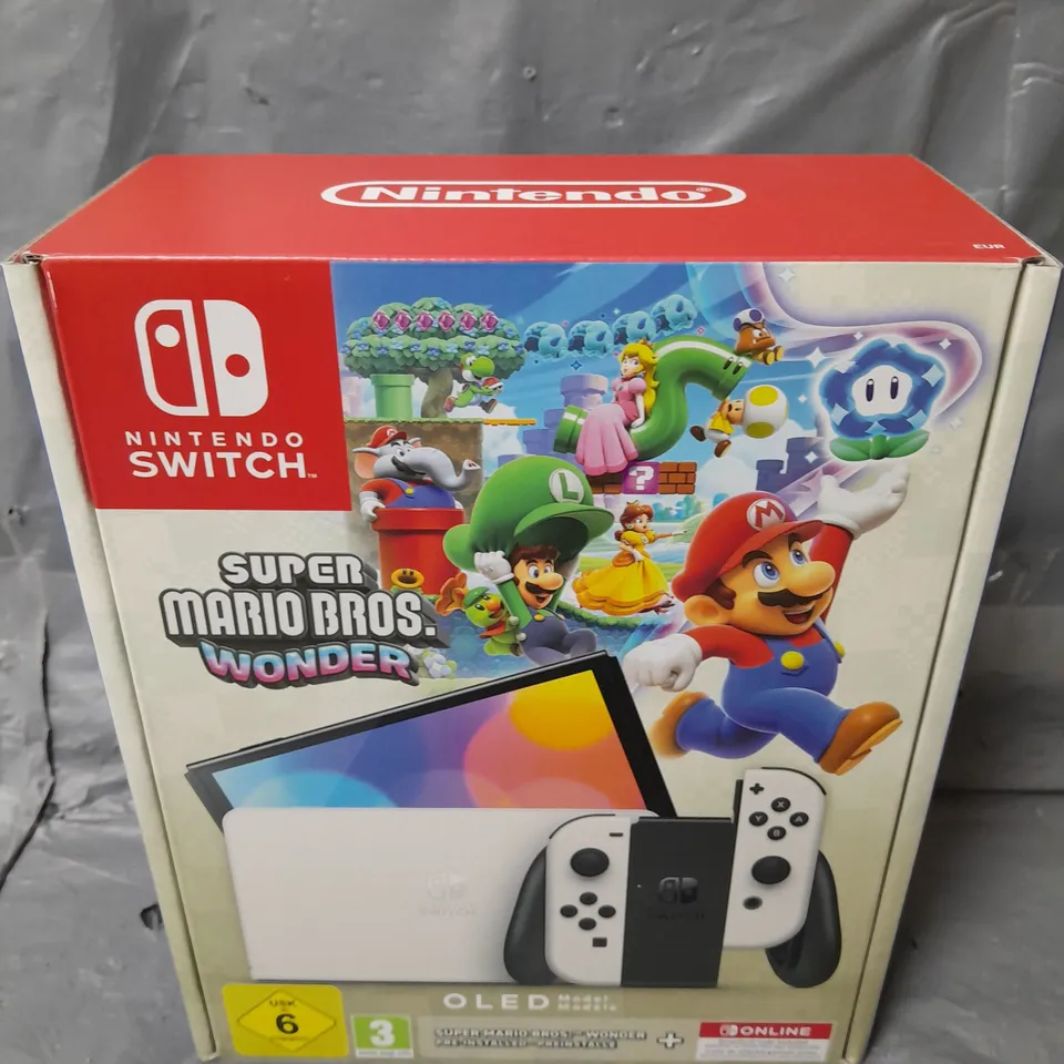 BOXED AND SEALED NINTENDO SWITCH OLED CONSOLE + SUPER MARIO BROS. WONDER