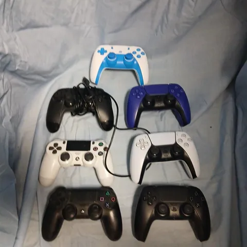 SEVEN ASSORTED CONTROLLERS FOR VARIOUS PLAYSTATIONS