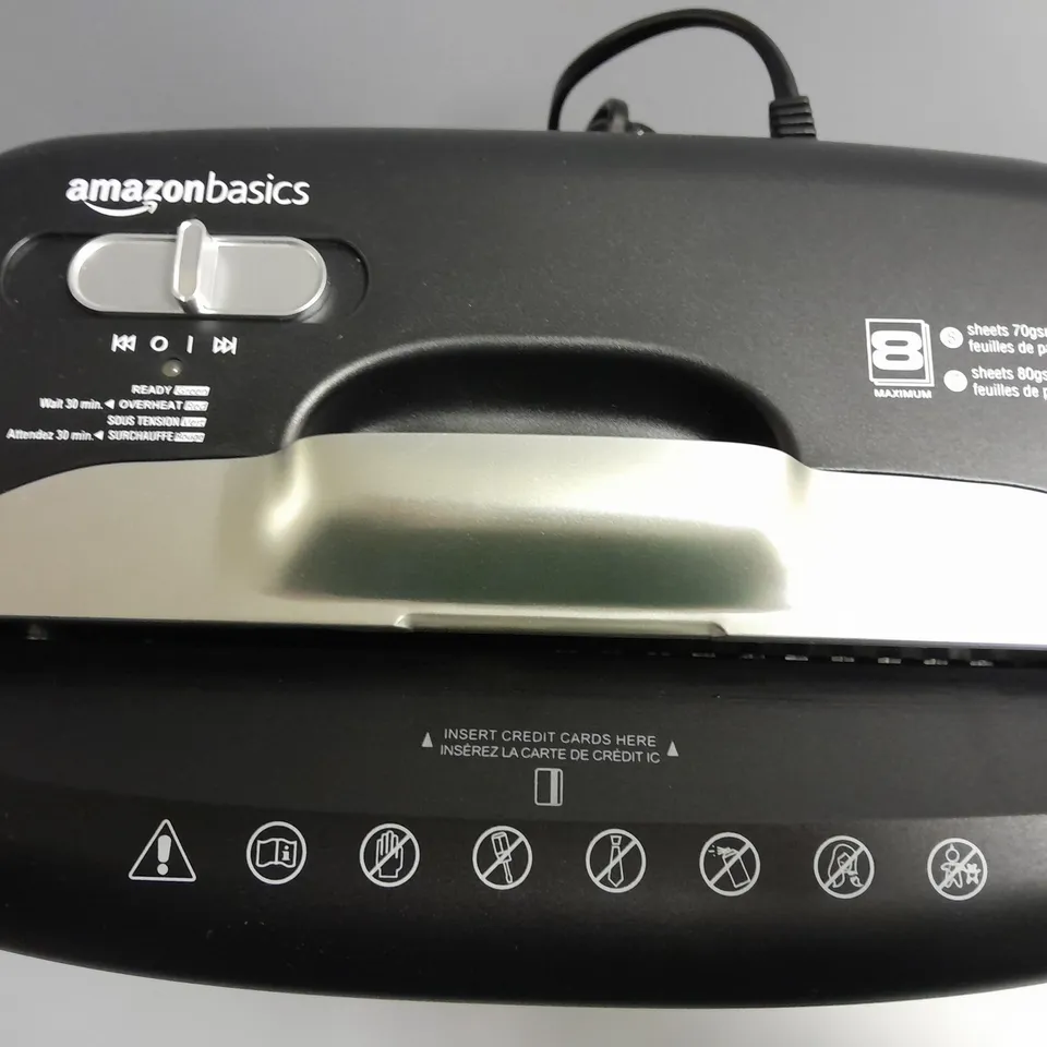 BOXED AMAZON BASICS CROSS CUT PAPER AND CREDIT CARD SHREDDER IN BLACK 