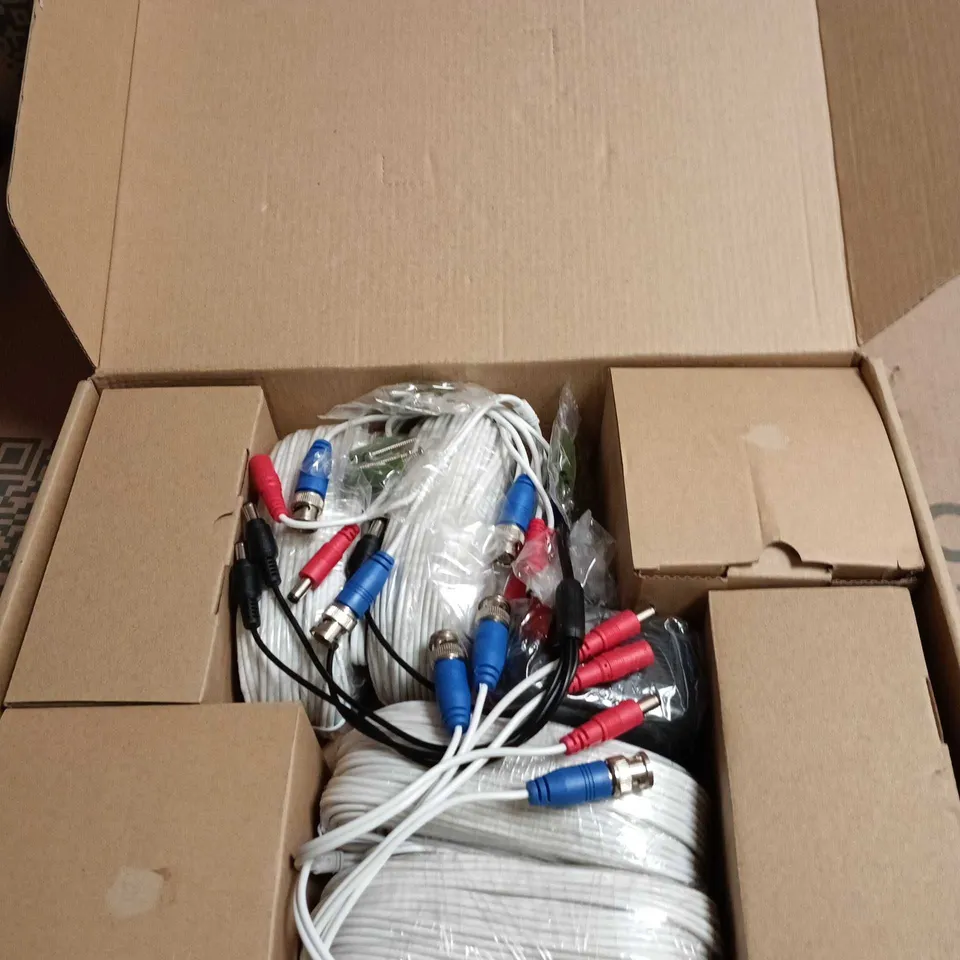 BOX OF SWANN HOME SECURITY CAMERAS WITH ACCESSORIES PRO-T852CAM AND PRO-T854CAM