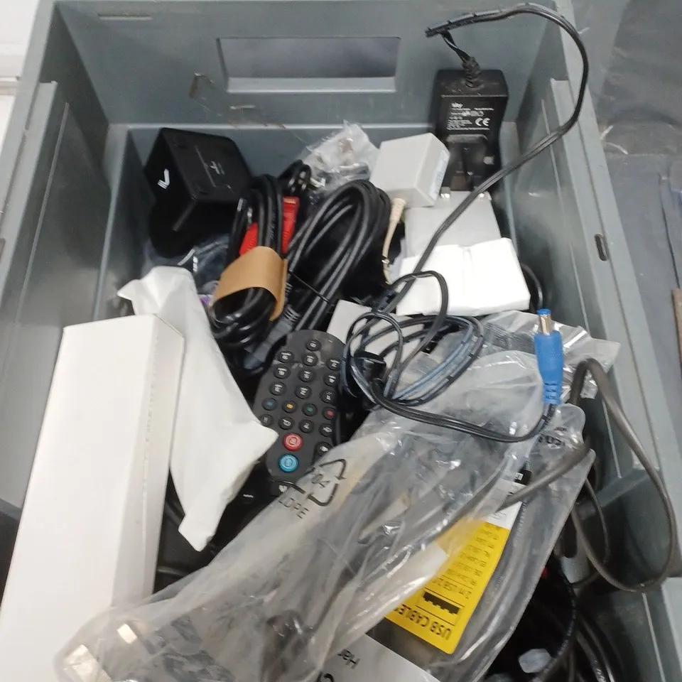 BOX OF APPROXIMATELY 15 ASSORTED ELECTRICXAL ITEMS TO INCLUDE REMOTE CONTROLS , CABLES AND PLUGS